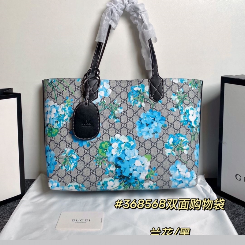 G*u*i shopping bags